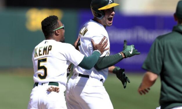 Olson bateó un doble de 2 carreras y los Atléticos vencieron a los Padres 5-4 en 10