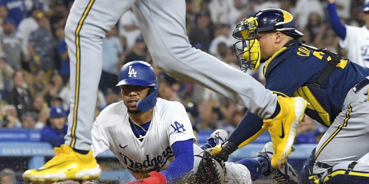 Dos interferencias del receptor ayudan a Dodgers a vencer a Brewers