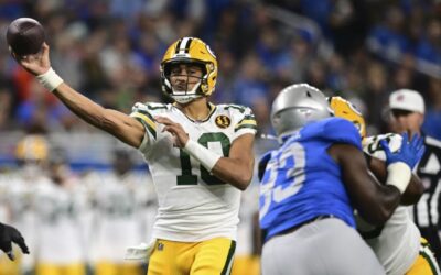Love brilla con 3 pases de TD y Packers doman 29-22 a Lions