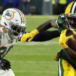 Love completa 2 pases de anotación con Reed y Packers doblegan 30-17 a Dolphins