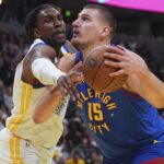 Jokic anota 38 puntos y lidera remontada en triunfo de Nuggets 119-115 ante Warriors