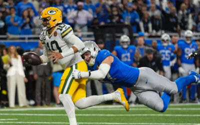 Love iguala su mejor marca personal con 4 pases de TD, llevando a los Packers a la victoria 31-24 sobre los Lions