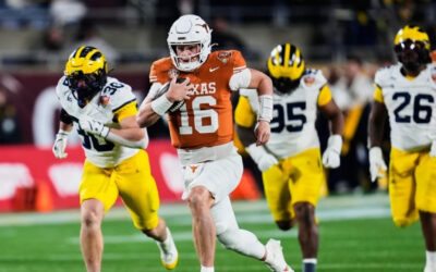 Manning lidera a Texas con brazo y piernas para vencer 41-27 a Michigan en el Citrus Bowl