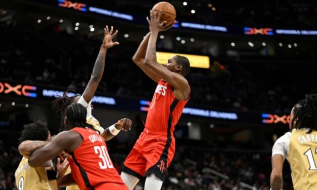 Rockets vencen a Wizards 123-118